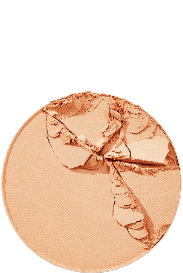 A close-up shot of a broken Maybelline Foundation Super Stay 16H powder, highlighting the product's fine consistency.