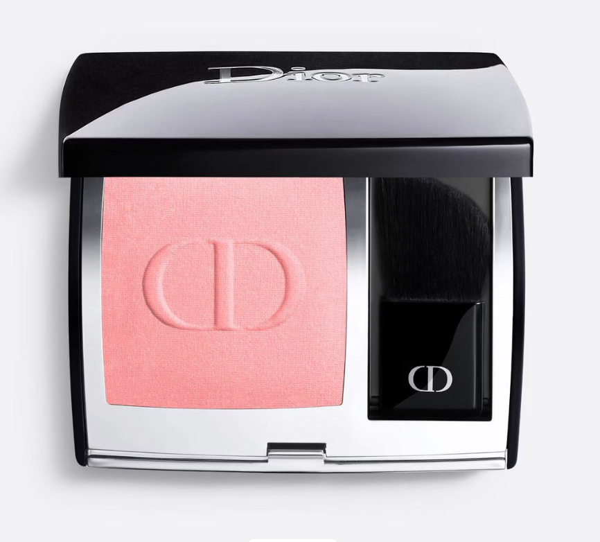 Premium Dior blush on in soft pink shade featuring embossed CD logo in signature black and silver compact with brush compartment.