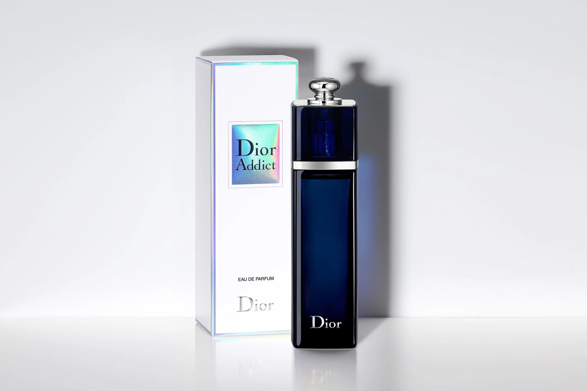 Dior Addict Eau de Parfum 100ml with white packaging box featuring blue label, luxury women's perfume from Dior.