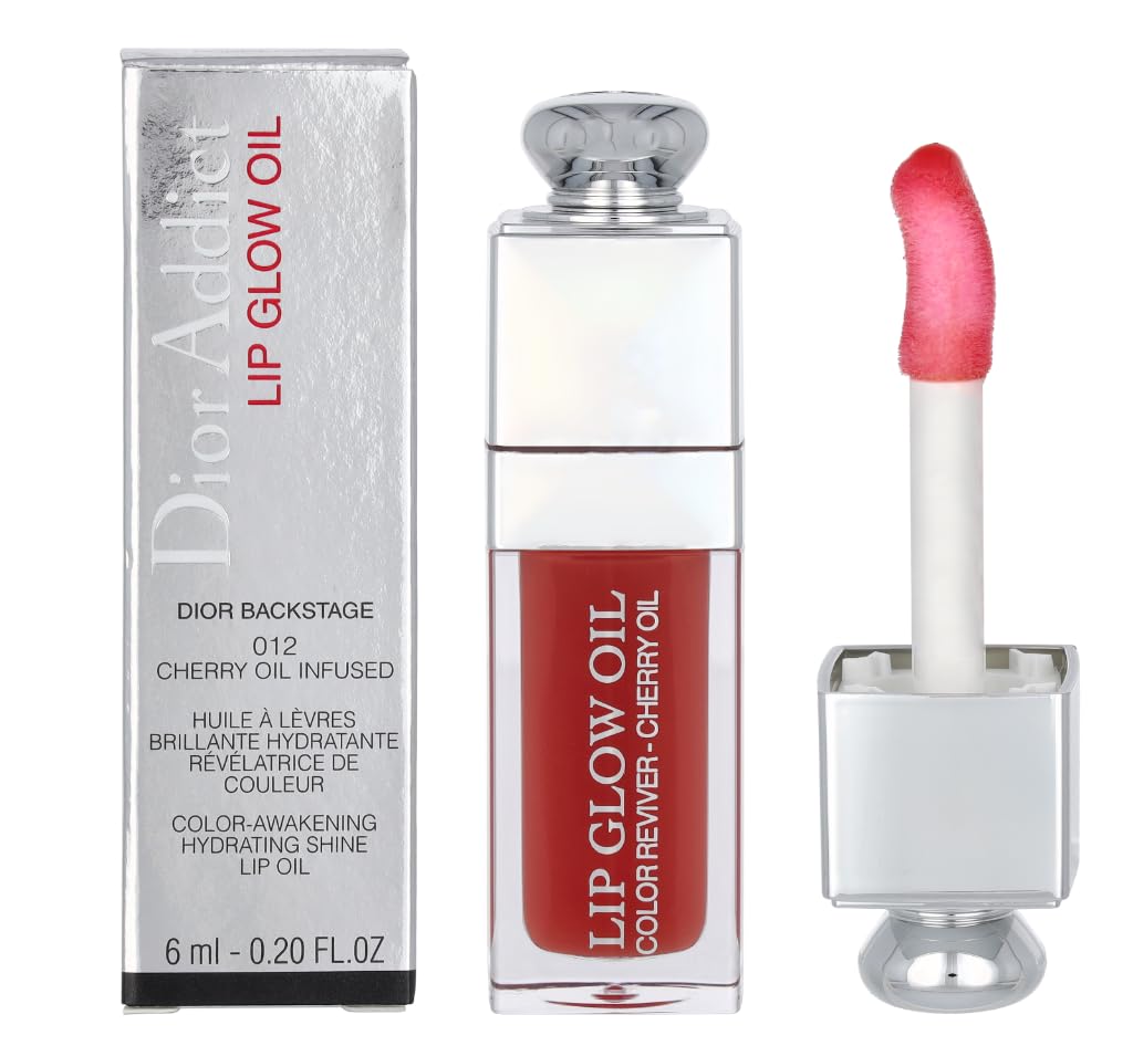Dior Addict Lip Glow Oil in vibrant red shade 012 with cherry oil infusion, shown with applicator and luxury packaging