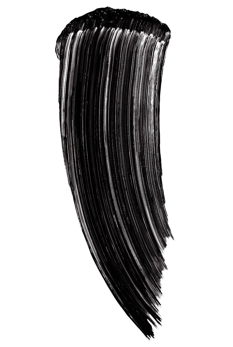 Close-up texture of the Maybelline Mascara in the shade Blackest Black, highlighting its intense black pigment.