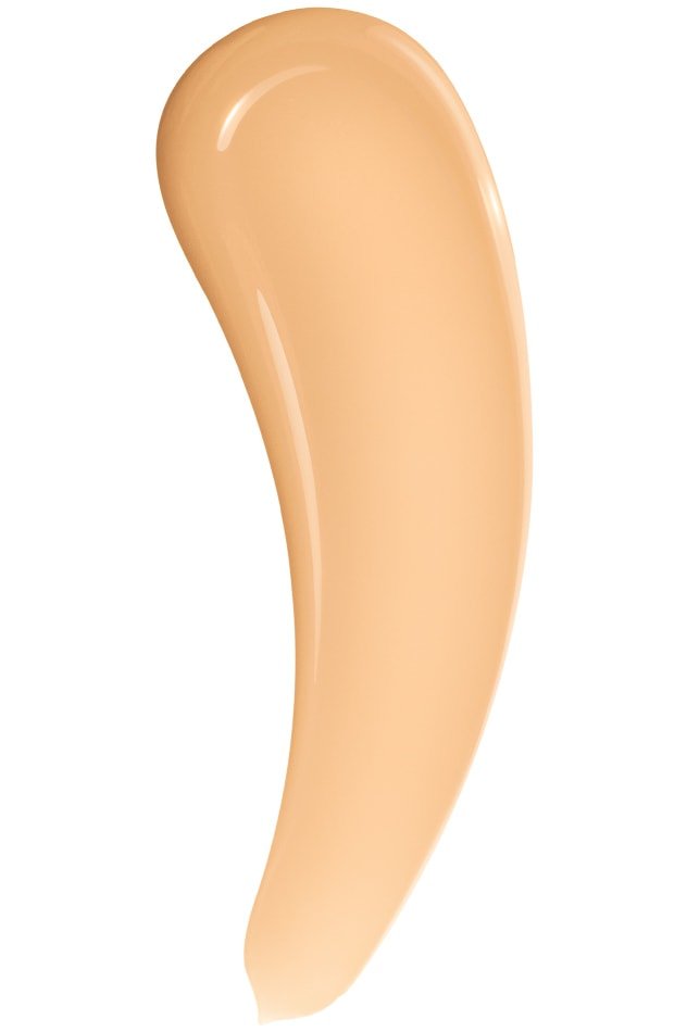 A close-up texture swatch of the creamy liquid Maybelline Foundation in Super Stay Lumi-Matte shade 128.