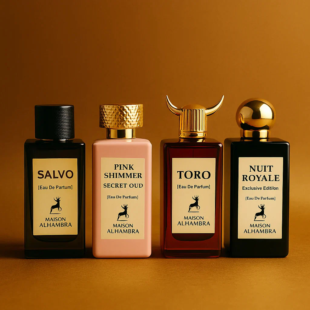 photograph displaying four Maison Alhambra perfumes luxurious and premium aesthetic for a perfume brand banner.
