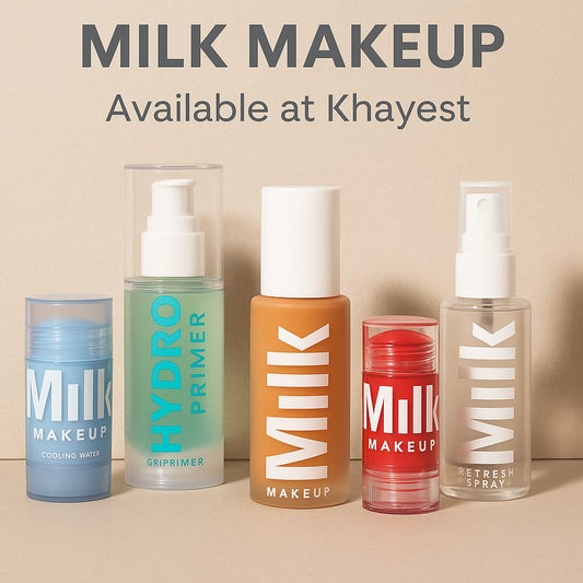 A high-quality image showing five Milk Makeup products including Hydro Primer, Cooling Water, Foundation, Lip + Cheek Tint, and Refresh Spray displayed neatly with text “Available at Khayest.”