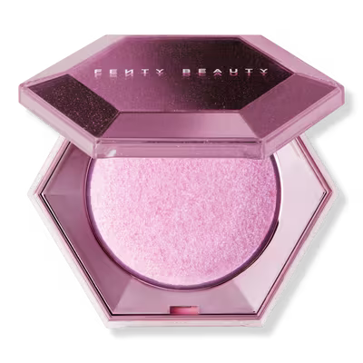 Fenty Beauty compact powder with pink shade on a white background
