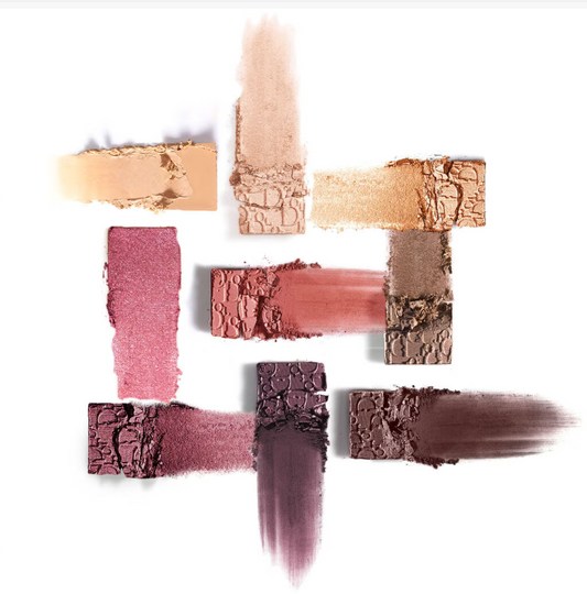 "Swatches of Dior Backstage Eyeshadow Palette showing pigmentation and texture of warm-toned shades including cream, gold, terracotta, pink, and deep burgundy in various finishes."