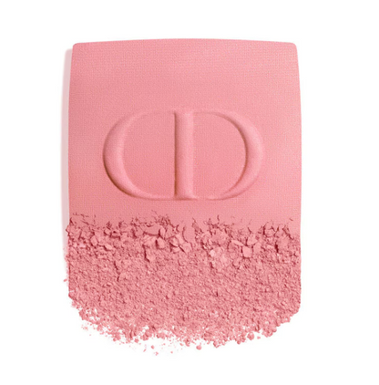 Close-up of Dior blush on powder texture and pigmentation in pink shade with CD embossing, showing fine powder consistency and color payoff.