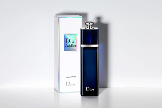 Dior Addict Eau de Parfum 100ml with white packaging box featuring blue label, luxury women's perfume from Dior.