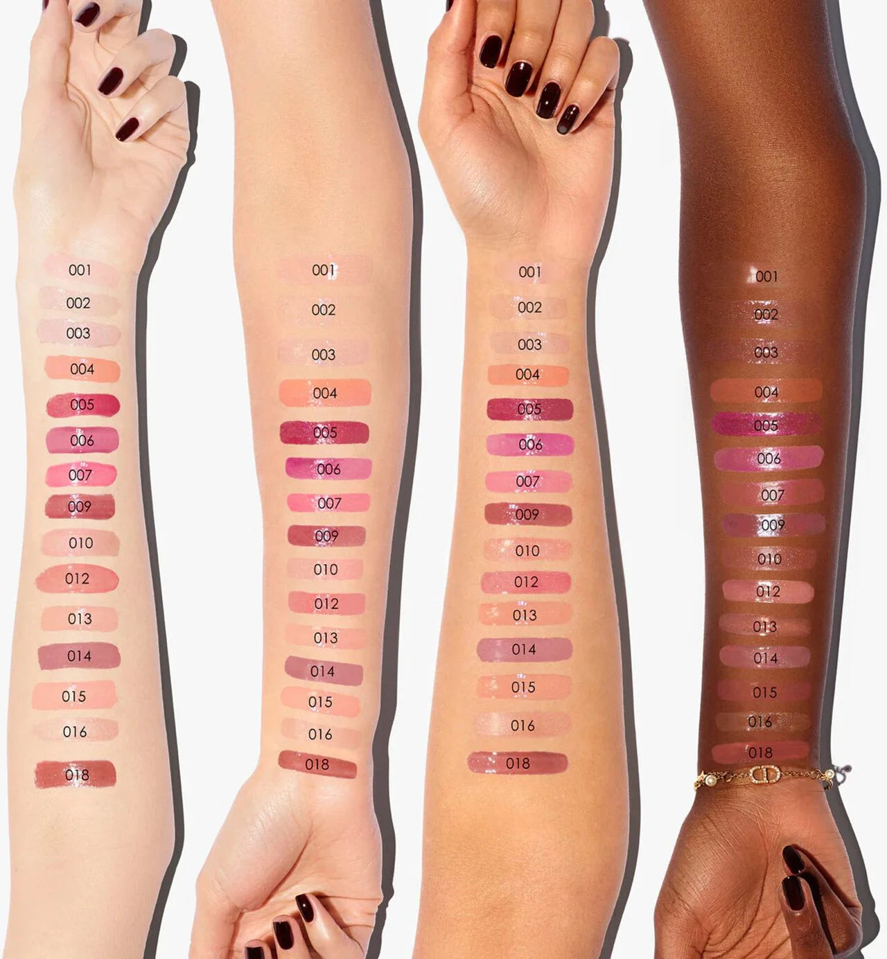 Arm swatches of the Dior Addict Lip Maximizer shade range on four different skin tones from light to deep.