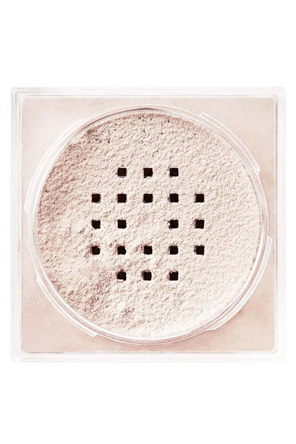 Top-down view of the Maybelline Fit Me Loose Face Powder container, showing the sifter and light powder texture.