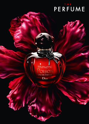Dior Hypnotic Poison EDP 100ml luxury perfume for women displayed on dramatic red flower petals against black background.